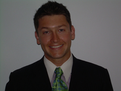 Professional male headshot in suit